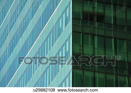 Stock Photo - USA, New York, New York City, Windows of office block. Fotosearch