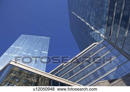 Stock Photo - USA, New York, White Plains, low angle view of skyscrapers. Fotosearch
