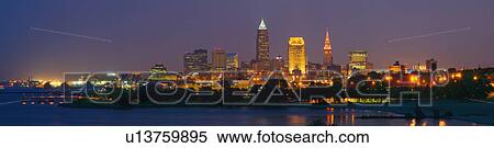 USA, Ohio, Cleveland, City skyline illuminated at dusk View Large Photo Image Stock Photography - USA, Ohio, Cleveland, City skyline illuminated at dusk. Fotosearch