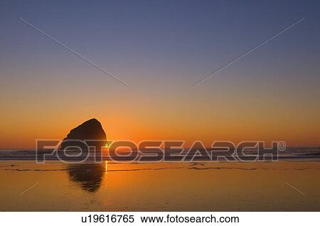 USA, Oregon, beach with stack rock View Large Photo Image Stock Photography - USA, Oregon, beach with stack rock. Fotosearch