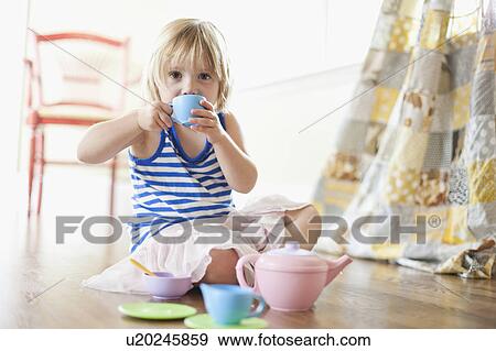 USA, Utah, Girl (2-3) playing on floor View Large Photo Image Stock Photo - USA, Utah, Girl (2-3) playing on floor. Fotosearch