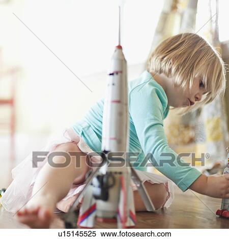 USA, Utah, Girl (2-3) playing on floor View Large Photo Image Stock Photography - USA, Utah, Girl (2-3) playing on floor. Fotosearch