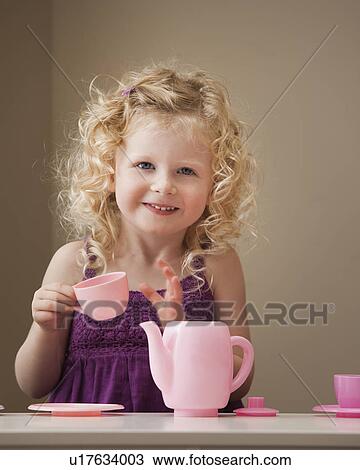 USA, Utah, Lehi, girl (2-3) playing with toy crockery View Large Photo Image Stock Image - USA, Utah, Lehi, girl (2-3) playing with toy crockery . Fotosearch