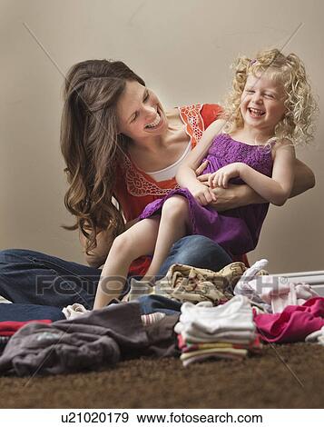 USA, Utah, Lehi, mother tickling daughter (2-3) View Large Photo Image Stock Photo - USA, Utah, Lehi, mother tickling daughter (2-3). Fotosearch