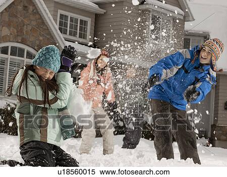 USA, Utah, Provo, Boys (10-11, 12-13) and girls (10-11, 16-17) having snow ball fight in front of house View Large Photo Image Stock Photography - USA, Utah, Provo, Boys (10-11, 12-13) and girls (10-11, 16-17) having snow ball fight in front of house. Fotosearch
