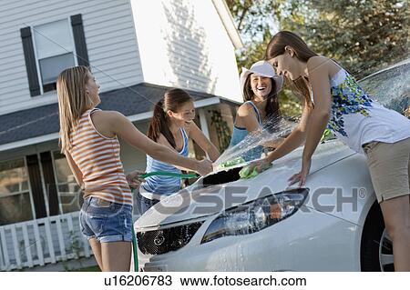 USA, Utah, Provo, Teenage girls (16-17) and young women watching car View Large Photo Image Stock Image - USA, Utah, Provo, Teenage girls (16-17) and young women watching car. Fotosearch