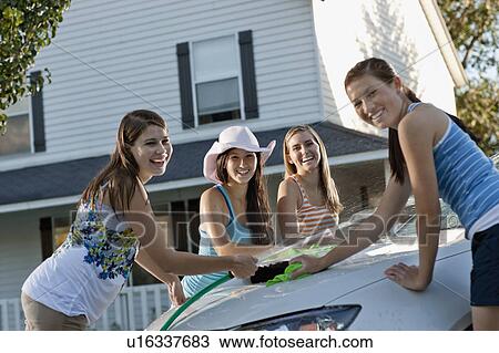 USA, Utah, Provo, Teenage girls (16-17) and young women watching car View Large Photo Image Stock Image - USA, Utah, Provo, Teenage girls (16-17) and young women watching car. Fotosearch