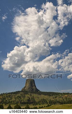Stock Image - USA, Wyoming, Clouds over Devil's Tower. Fotosearch