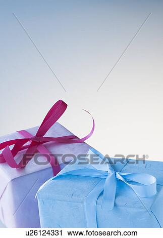 Stock Image - Wrapped birthday gifts. Fotosearch