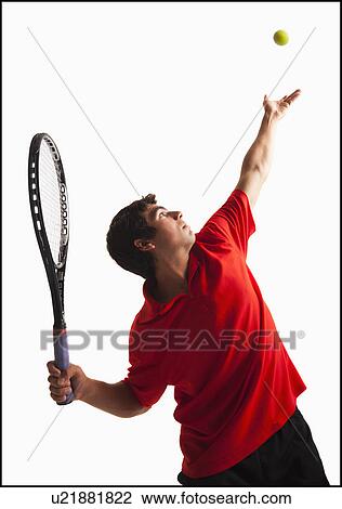 Young man playing tennis View Large Photo Image Stock Image - Young man playing tennis. Fotosearch