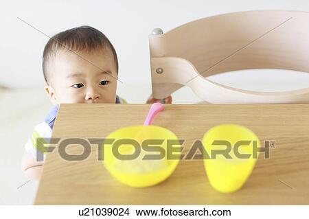 A boy looking at food View Large Photo Image Picture - A boy looking at food. Fotosearch