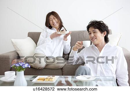 A couple having a teatime View Large Photo Image Stock Image - A couple having a teatime. Fotosearch