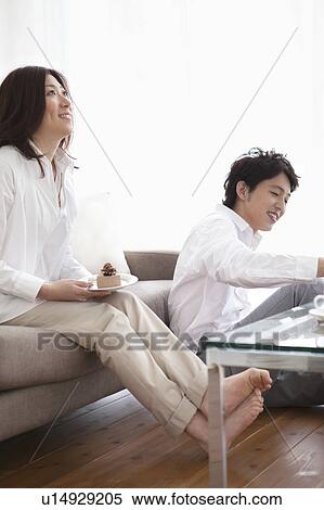 Stock Photography - A couple having a teatime. Fotosearch