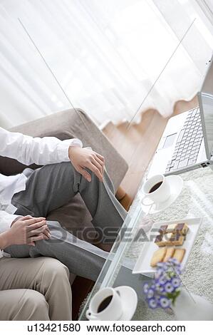 A couple holding hands View Large Photo Image Stock Image - A couple holding hands. Fotosearch