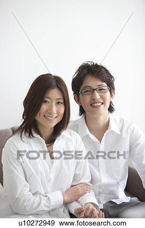 A couple holding hands View Large Photo Image Stock Photo - A couple holding hands. Fotosearch