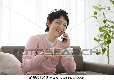 A man talking on the cell phone View Large Photo Image Stock Photograph - A man talking on the cell phone. Fotosearch