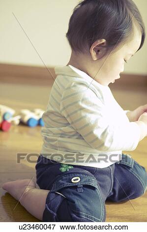Baby Girl Kneelling View Large Photo Image Stock Photo - Baby Girl Kneelling. Fotosearch