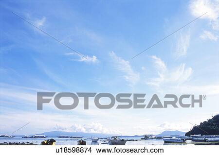 Blue Sky Over Moored Boats View Large Photo Image Picture - Blue Sky Over Moored Boats. Fotosearch