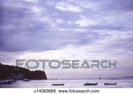 Stock Photograph - Boats Moored in Sea. Fotosearch