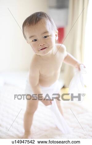 Boy Standing Portrait Looking At Camera Smiling View Large Photo Image Stock Image - Boy Standing Portrait Looking At Camera Smiling. Fotosearch