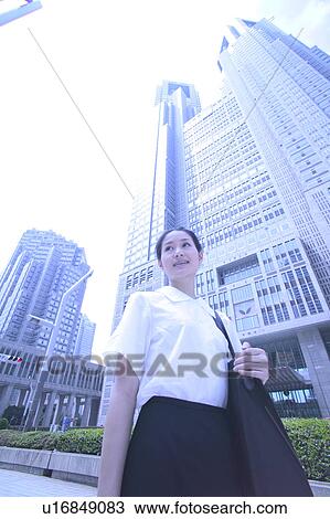 Stock Image - Businesswoman in Shinjuku Ward. Fotosearch