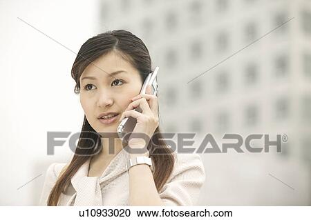 Stock Image - Businesswoman on Phone. Fotosearch