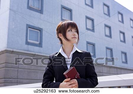 Stock Image - Businesswoman Outdoors. Fotosearch