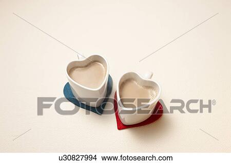Picture - Coffee in Heart Shaped Cups. Fotosearch
