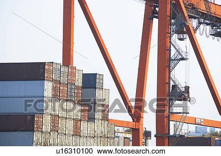 Stock Image - Commercial Dock Crane Architecture Sky Copy Space. Fotosearch