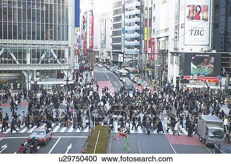 Stock Image - Crowd Crossing Street. Fotosearch