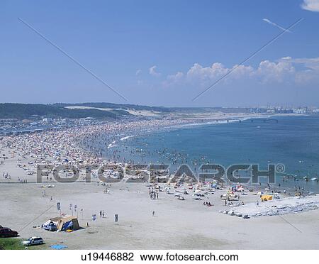 Stock Image - Crowded Beach. Fotosearch