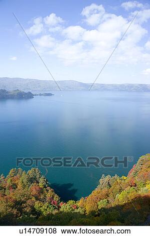 Stock Photo - Cumulus Clouds Over Lake Towada. Fotosearch
