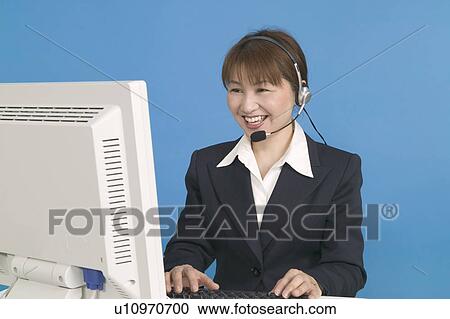 Stock Image - Customer Service Representative Working. Fotosearch