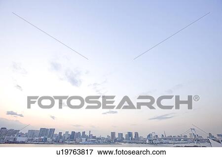 Stock Photo - Evening Sky Over Rainbow Bridge. Fotosearch