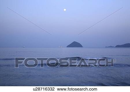 Stock Image - Full Moon Over Sea. Fotosearch