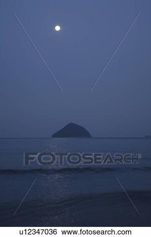 Stock Photograph - Full Moon Over Sea. Fotosearch