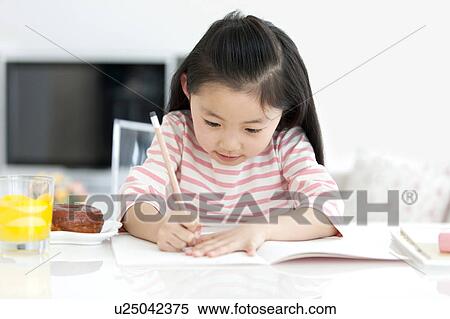 Girl doing homework View Large Photo Image Stock Photography - Girl doing homework. Fotosearch