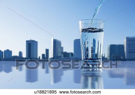 Stock Photography - Glass Water Pouring Drink Skyline Urban Scene. Fotosearch