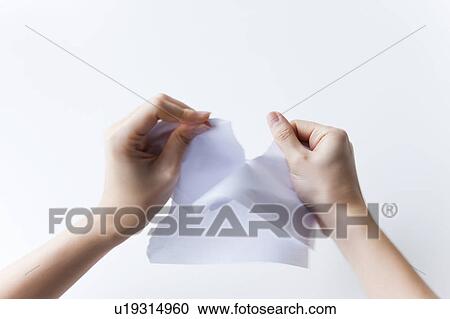 Hand of woman ripping document View Large Photo Image Stock Image - Hand of woman ripping document. Fotosearch