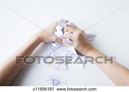 Hand of woman ripping document View Large Photo Image Stock Photo - Hand of woman ripping document. Fotosearch