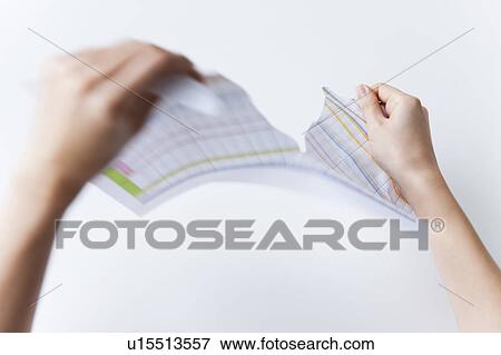 Hand of woman ripping document View Large Photo Image Stock Photo - Hand of woman ripping document. Fotosearch