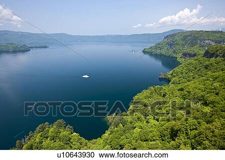 Stock Image - Lake Towada Water Nautical Vessel Forest Cloud Sky. Fotosearch