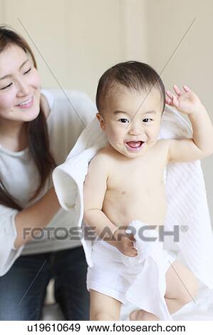 Mother Son Drying Towel Looking At Camera Smiling View Large Photo Image Stock Photo - Mother Son Drying Towel Looking At Camera Smiling. Fotosearch