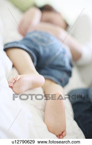 Mother Son Sleeping Next To Lying Down Barefoot View Large Photo Image Stock Photo - Mother Son Sleeping Next To Lying Down Barefoot. Fotosearch