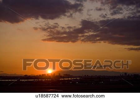 Picture - Mount Fuji at Sunset, Seen from Haneda Airport. Fotosearch