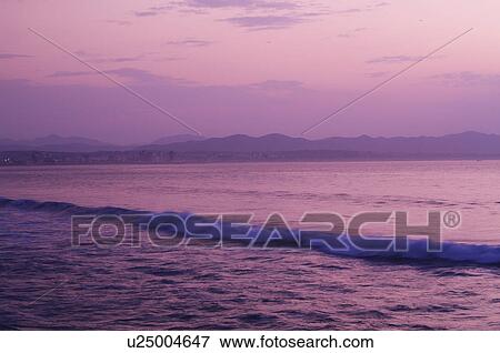 Stock Photo - Omori Beach Sea Mountain Range Dramatic Sky. Fotosearch