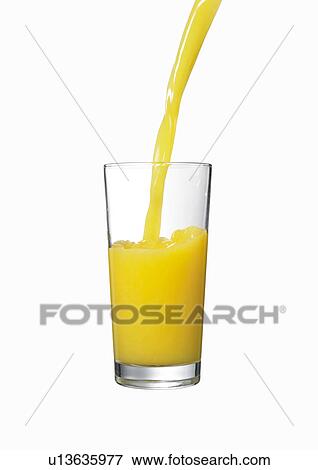 Stock Photo - Orange Juice Being Poured. Fotosearch