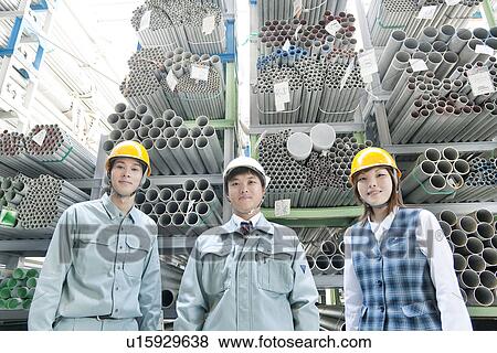 Portrait of Three Warehouse Workers View Large Photo Image Stock Photo - Portrait of Three Warehouse Workers. Fotosearch