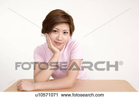 Stock Image - Portrait of Young Woman. Fotosearch