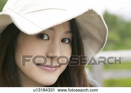 Stock Image - Portrait of Young Woman. Fotosearch